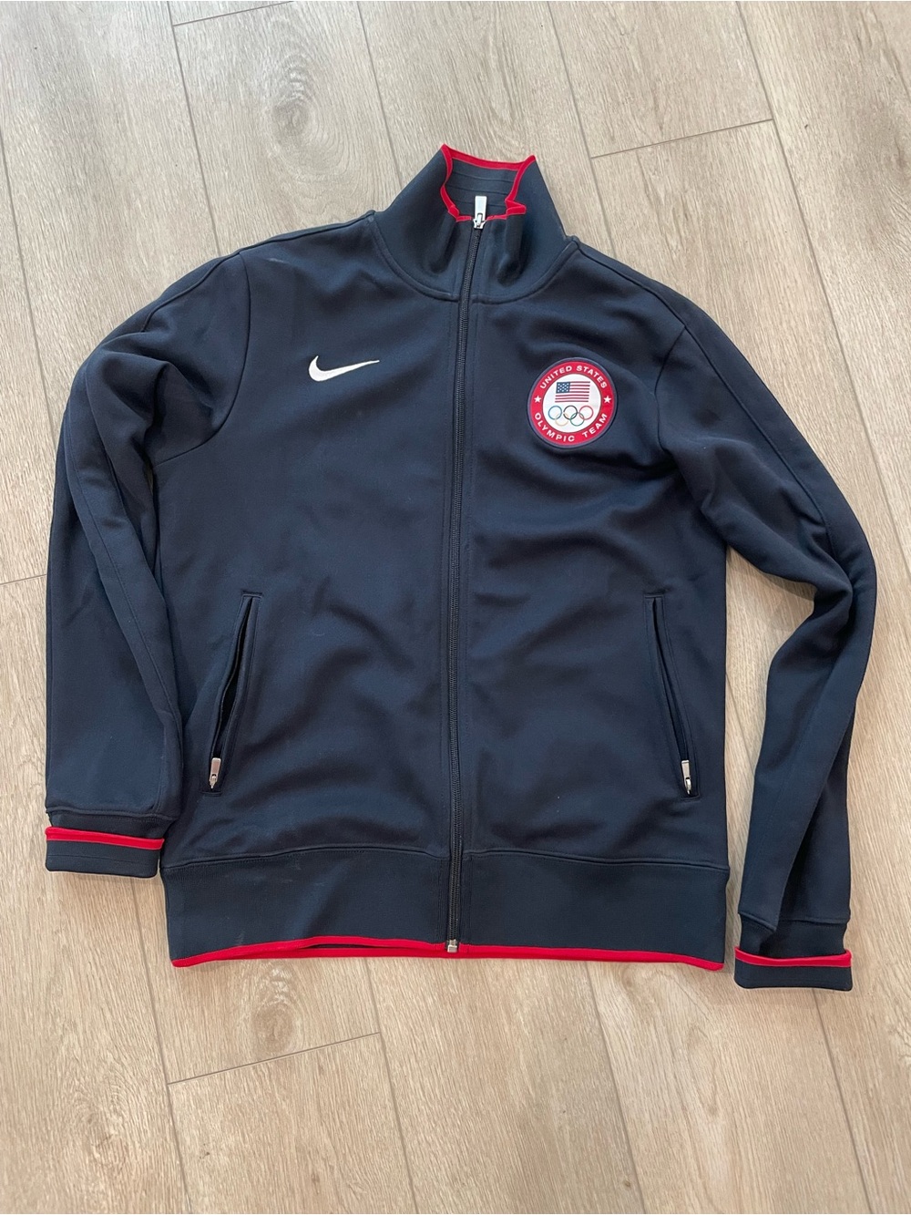Nike Navy Track Jacket with Red Trim and Olympic Patch